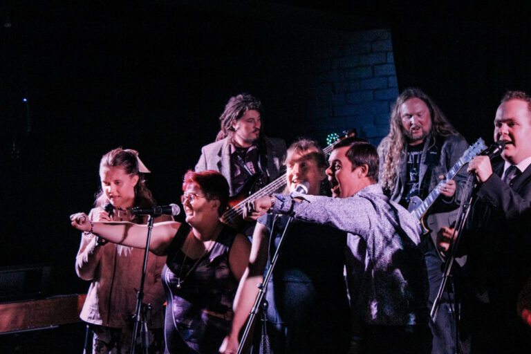 Band with starability on stage having fun